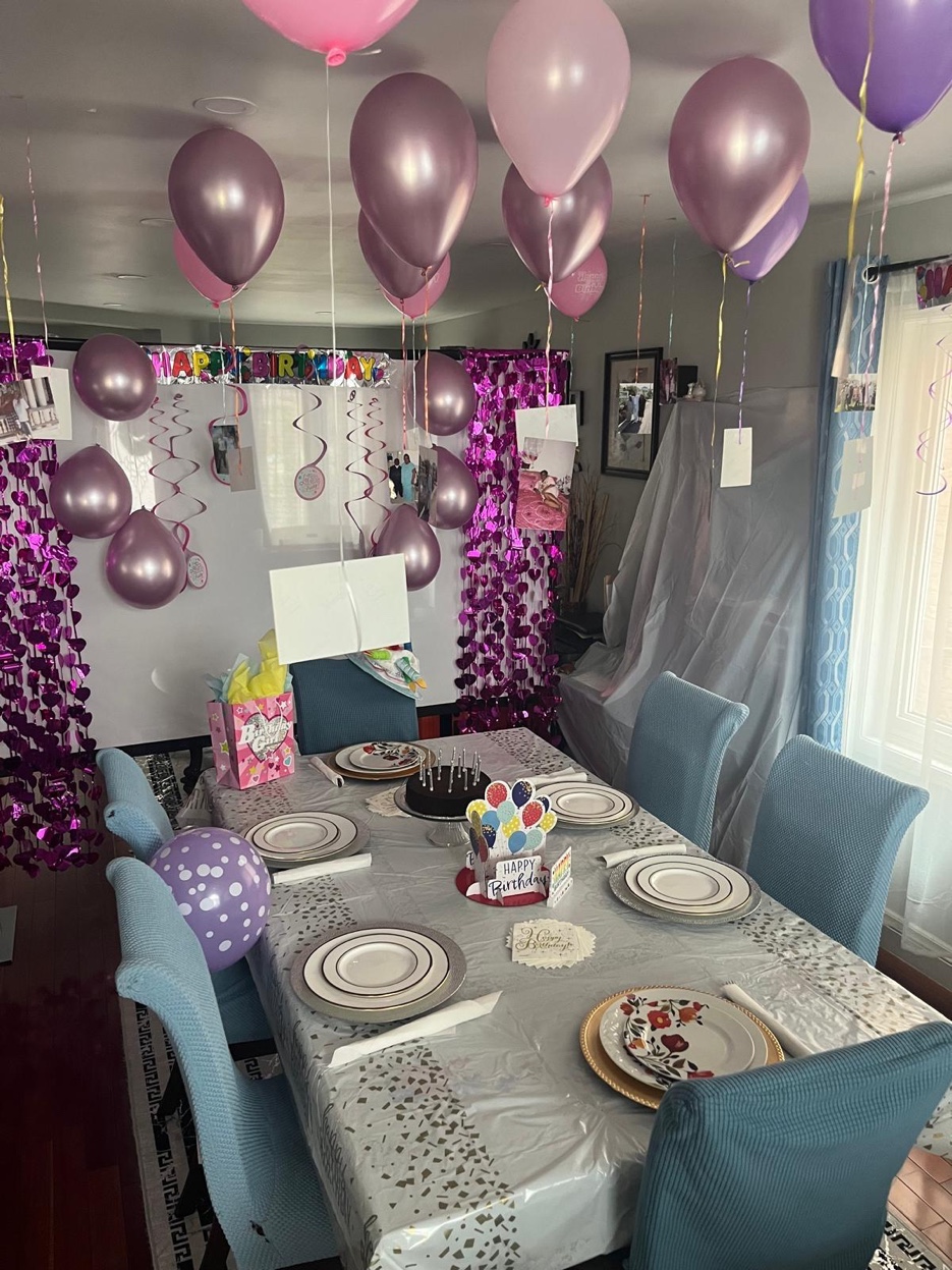 Birthday party table with balloons